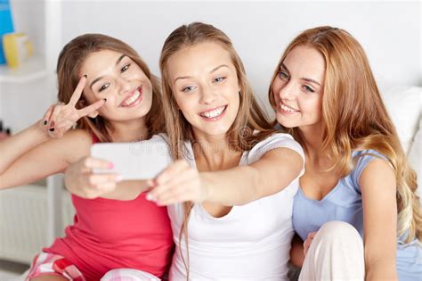 teen girls with smartphone taking selfie at home stock image image 64670513