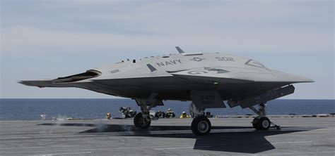 navy launches jet sized drone  aircraft carrier   time cbs news