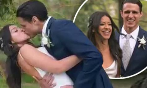 gina rodriguez wears a gorgeous silk gown as she marries joe locicero