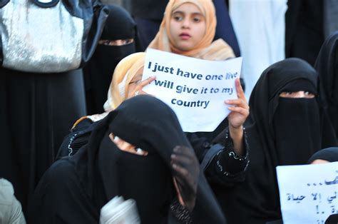 File Arab Girl Holding Anti Govt Poster