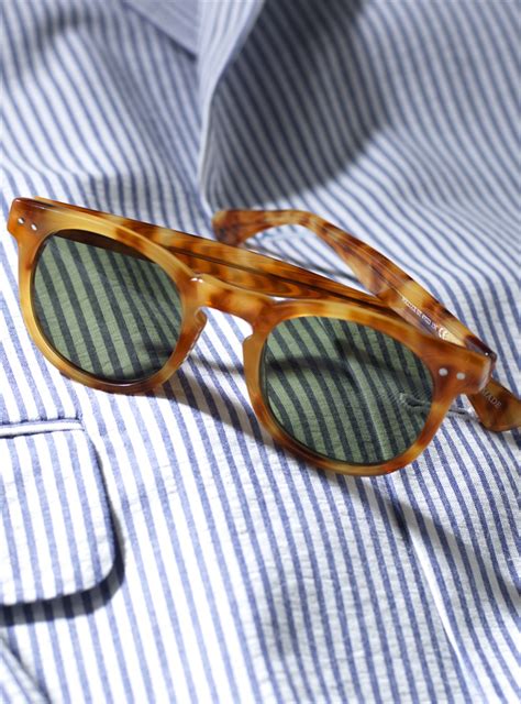 semi round sunglasses in honey with green lenses the ben silver