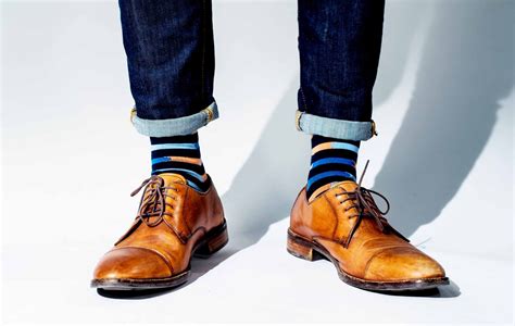 pair colorful socks  brown shoes society socks