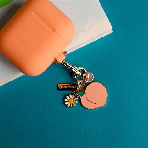 items  sets airpods case dust guard secure fit keyring   apple