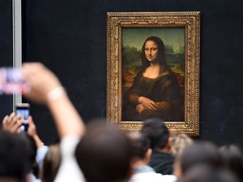mona lisa s smile clearer through louvre s new bullet proof glass