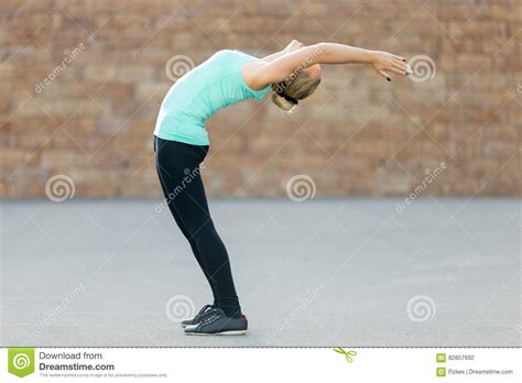 standing  bend pose stock photo image   fitness