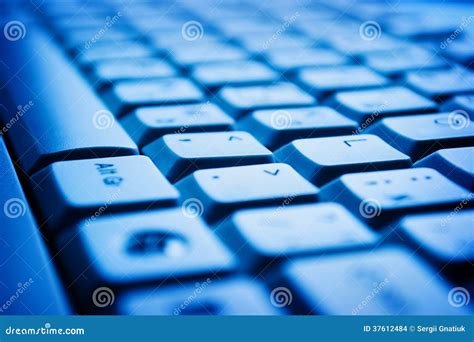 computer keyboard  blue light stock photo image  input desktop