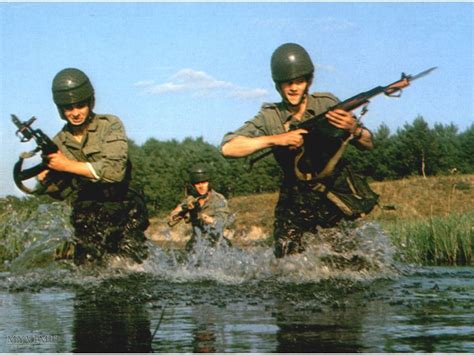 polish peoples army commandos crossing  stream military