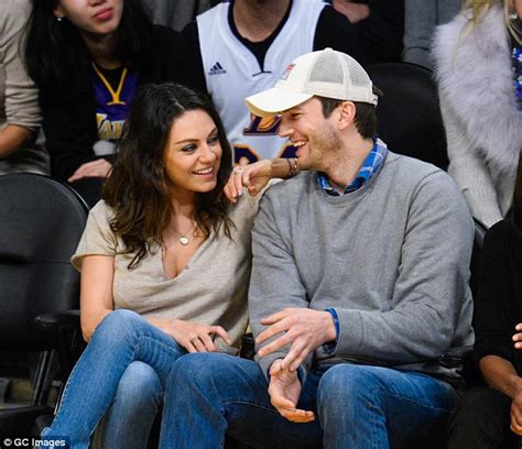 mila kunis admits she and ashton kutcher are married on corden s the