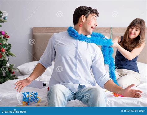 young happy family celebrating christmas  bed stock photo image