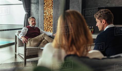 psychologist listening to couple during therapy session
