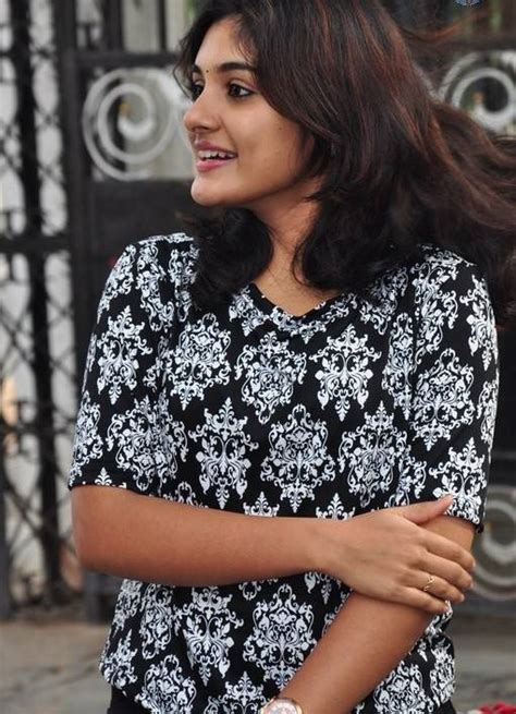 indian filmy actress niveda thomas photos in black dress tollywood stars