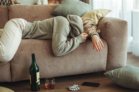Premium Photo Drunk Woman Lying On A Sofa