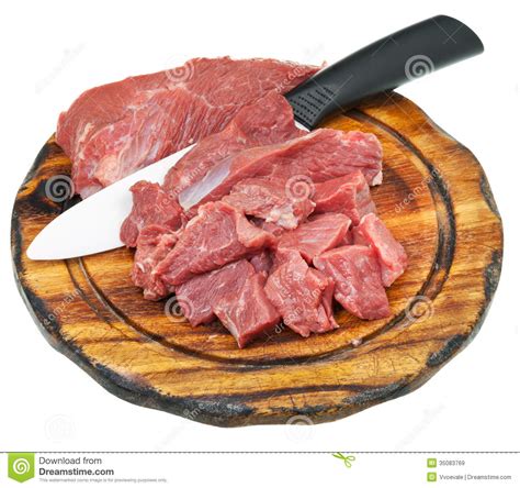 cut raw meat  ceramic knife  cutting board royalty  stock images image