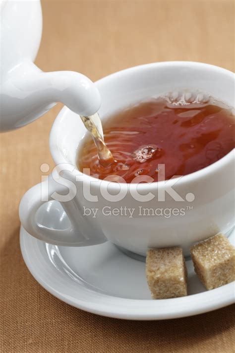 pouring tea stock photo royalty  freeimages