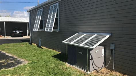 bahama awning shade  air conditioner haggetts aluminum