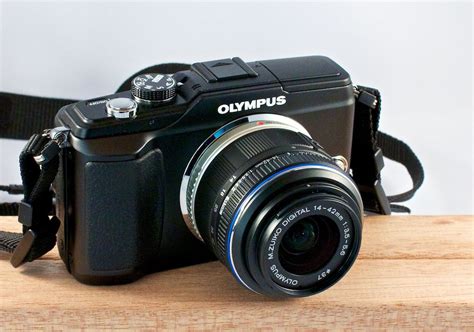 olympus releases    pl affordable system camera  digital story