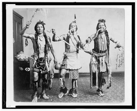 [three Native American Men In Traditional Clothing Posed As If