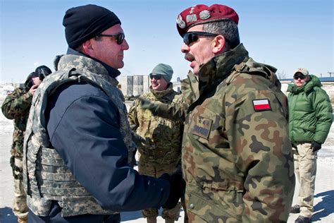 deputy defense secretary meets with polish troops discusses illinois