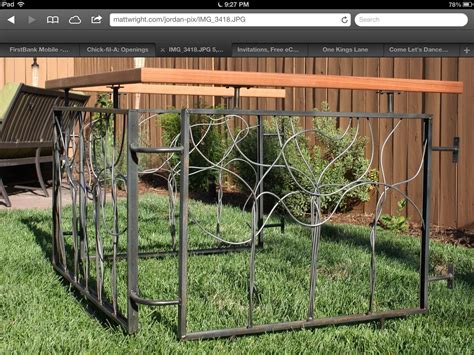 hand crafted artistic steel  wood fence  edison