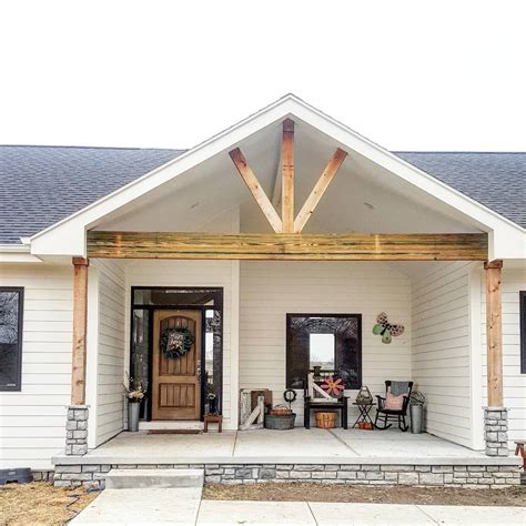 vaulted front porch  wooden beams ranch farmhouse house front porch porch remodel house