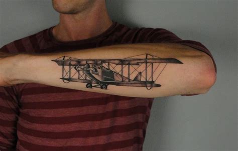amazing airplane tattoo on arm tattoomagz › tattoo designs ink works body arts gallery
