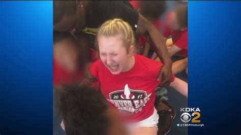 videos show high school cheerleaders forced into splits youtube