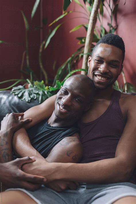 Portrait Of Gay Black Men Couple In Their Living Room By