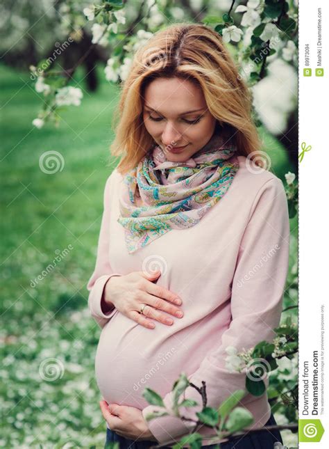 beautiful pregnant woman walking outdoor nature stock image 26947693