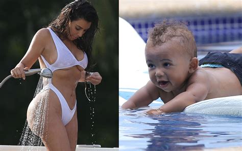 kim kardashian poses nearly naked with north and saint west