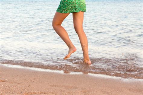 Woman Legs On The Sunset Beach Stock Image Image Of Legs