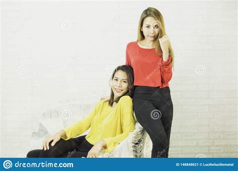 Asian Lesbian Women Lgbt Lesbians Wearing Yellow And Red Shirts Long