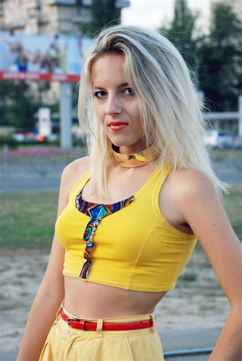 yellow cropped top living in a kitten s world