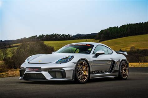 porsche  cayman gt   track suit  manthey racing carscoops