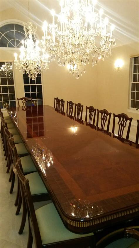 large  foot mahogany extension dining table seats
