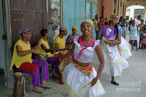 cuban band los 4 vientos and dancers entertaining people in the street in havana traditional