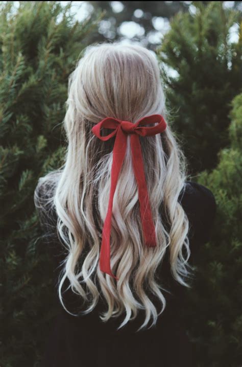 beautiful easy half up do with a red ribbon to spice things up