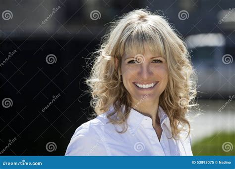 Portrait Of A Happy Blond Woman Outside Stock Image Image Of