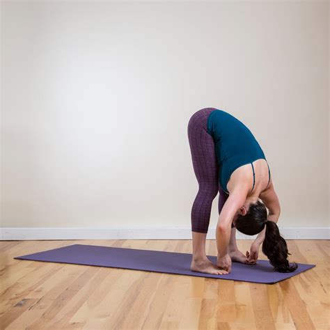 standing forward bend before bed yoga sequence popsugar fitness photo 3