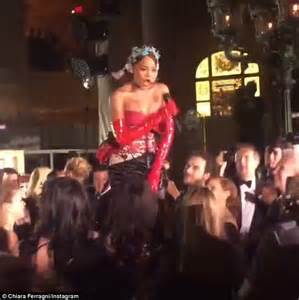 rihanna suffers a double nip slip as she goes braless and displays