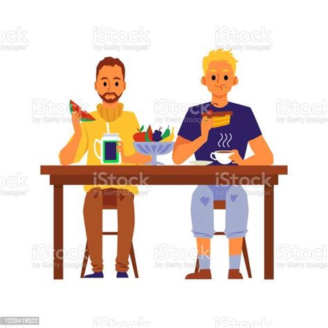 Two Men Eating Food Sitting Behind Table People Having Lunch Together