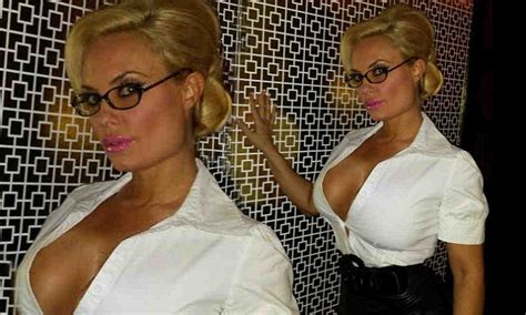 coco austin dresses up as a sexy secretary in glasses leather skirt and plunging shirt daily