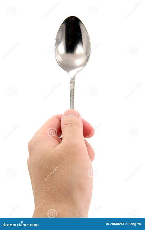 holding spoon stock  image