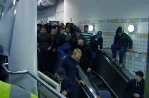 Watch Football Hooligans Tumble As Escalator Fails Daily Star