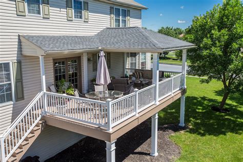 covered porch  hip style roof covered deck designs covered decks backyard patio designs