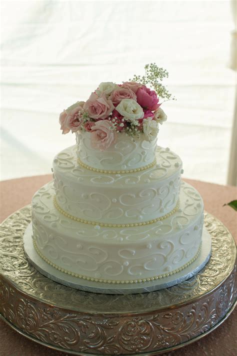 traditional  tiered wedding cake  pink roses
