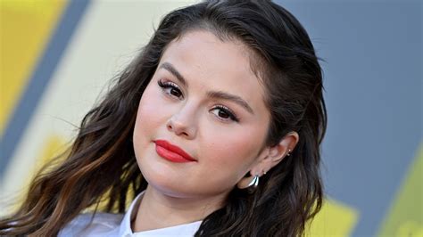 Selena Gomez Had The Perfect Accessory For Her Two Piece Houndstooth