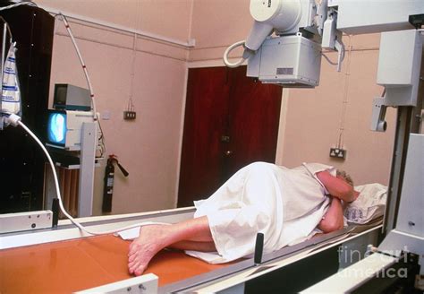 Woman Undergoing A Barium Enema X Ray Examination Photograph By Antonia