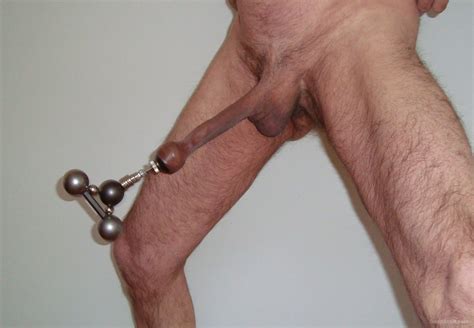 foreskin stretching with weights hanging to make it longer