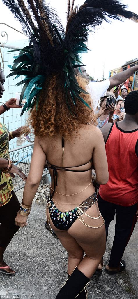 Rihanna Shows Off Her Curvy Figure As She Parties At