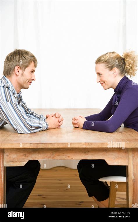 couple sitting      smiling stock photo alamy